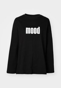 Crna majica dugih rukava od pamuka s okruglim izrezom i velikim bijelim grafičkim natpisom "mood" na prednjoj strani. Opusti kroj.