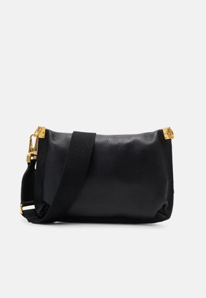 Black leather bag with a textured finish, featuring a gold hardware clasp and an adjustable canvas strap. Compact rectangular shape.