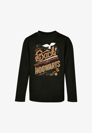 Sort langærmet skjorte med farverig "Back to Hogwarts" grafik med en ugle, et tog og varierende design, lavet af blødt bomuldsstof.