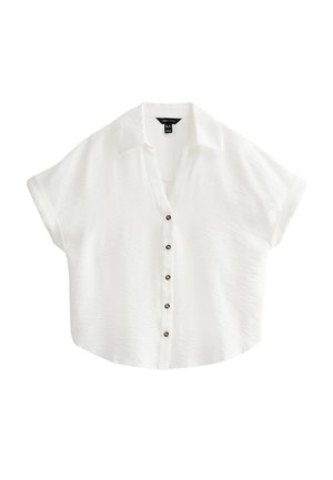 Witte blouse met korte mouwen en knopen voor, met kraag en vijf donkere knopen aan de voorkant, losvallende pasvorm en licht afgeronde zoom.