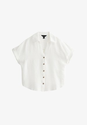 White short-sleeve button-up blouse with collar and five dark buttons down the front, loose fit and slightly curved hem.