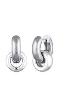 Boucles d'oreilles en argent avec un design en maillons, surfaces lisses et polies, et une finition brillante. Formes circulaires entrelacées au centre.