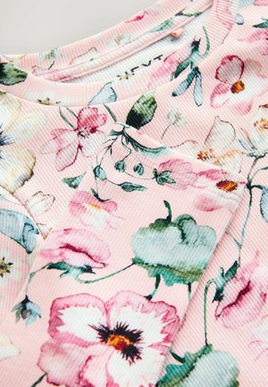 Floral patterned top in pink, featuring a ribbed texture. Design includes various flowers with green leaves, subtle detailing around the neckline.