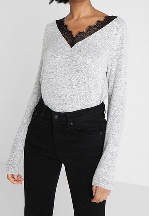 Neule - mottled light grey