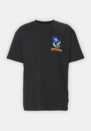 Black short-sleeve t-shirt with a blue flower and green leaves graphic above the word "UTOPIA" in orange on the left chest.