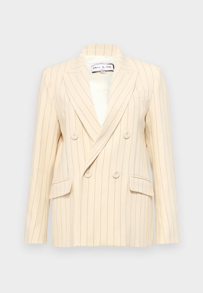 Beige inslag dubbele-breasted blazer met notch-lapels, twee voorzakken en witte voering. Heeft ronde knopen en een gestructureerde vorm.