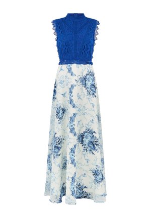 Abito lungo senza maniche con corpetto in pizzo blu reale e gonna bianca con motivi floreali e uccelli blu.