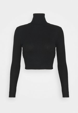 Sort ribbet turtleneck trøje med lange ærmer og en cropped cut. Har en blød tekstur og tætsiddende design, velegnet til lagdeling.