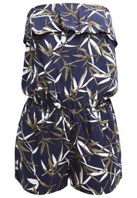Combinaison bleu marine en tissu léger avec motif de feuilles blanches et dorées, dotée d'un décolleté épaules dénudées et d'une taille élastique.