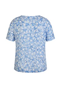 Kurzarmhemd aus Baumwolle mit einem blauen Blumenmuster auf hellblauem Hintergrund, im lockeren Schnitt und mit rundem Ausschnitt.