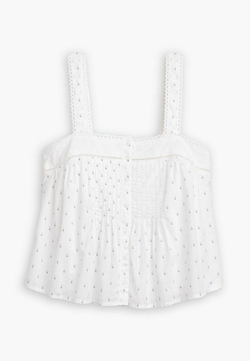 Camiseta de algodón blanca con tirantes finos, cuerpo fruncido y botones decorativos, que presenta un estampado floral disperso y un borde de encaje.