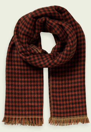 Rustrød og sort hundetandsmønstret halstørklæde med frynser i kanterne, foldet i en løkke med begge ender hængende ned.