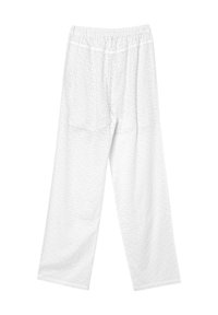 Pantalons en coton blanc à coupe ample, présentant un motif d'œillets texturé, une taille élastique et des jambes larges à coupe droite.