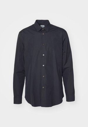 Temno modra srajca z dolgimi rokavi in gumbi, izdelana iz gladkega materiala, z značilnim ovratnikom in petimi sprednjimi gumbi, ki imajo kontrastne barve.