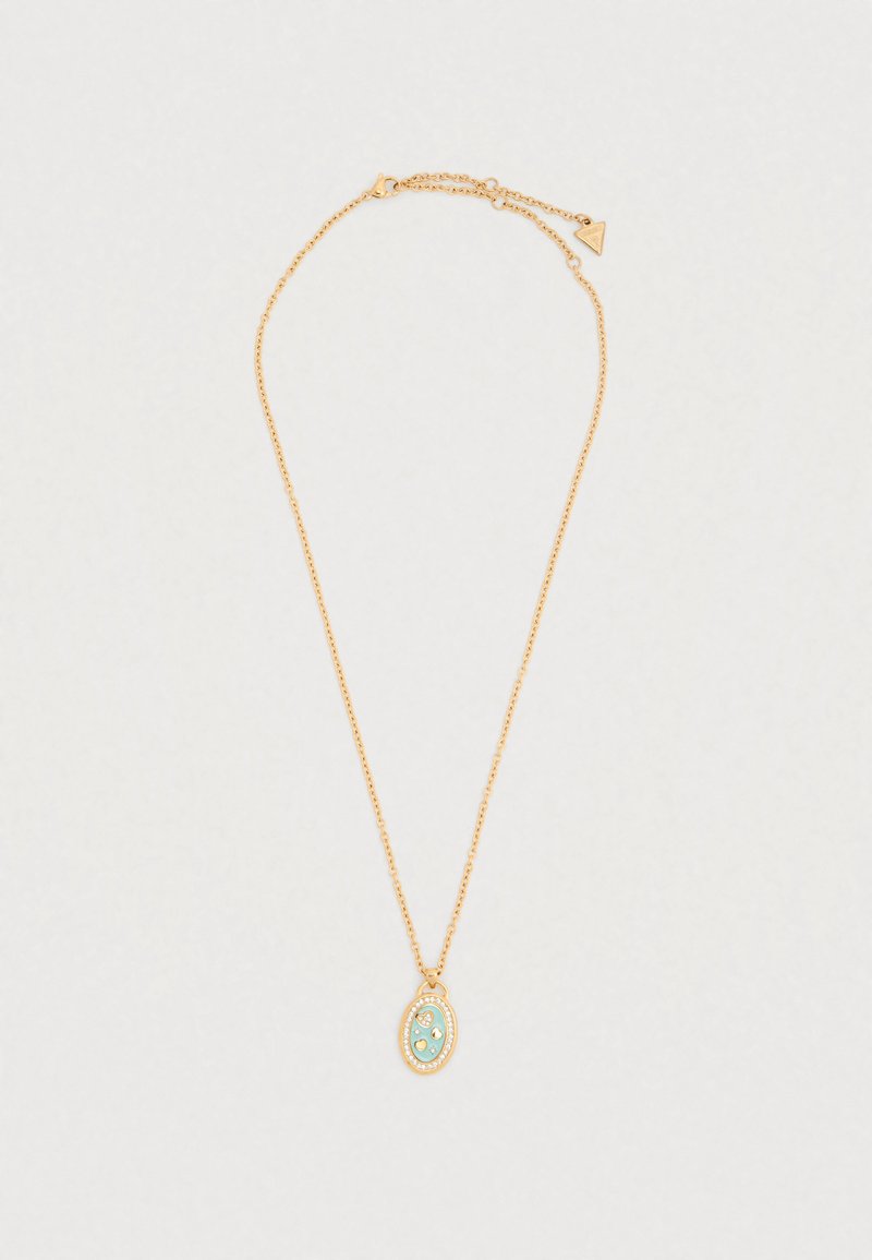 Κολιέ σε χρυσό τόνο με λεπτή αλυσίδα, που διαθέτει οβάλ μενταγιόν με επιφάνεια από ανοιχτό μπλε σμάλτο και διακοσμητικές πέτρες σε μια διακοσμητική διάταξη.