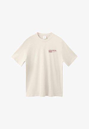 Kremowy bawełniany t-shirt z krótkimi rękawami, o luźnym kroju, z czerwonym nadrukiem na piersi z napisem „EQUESTRIAN PRIDE”.