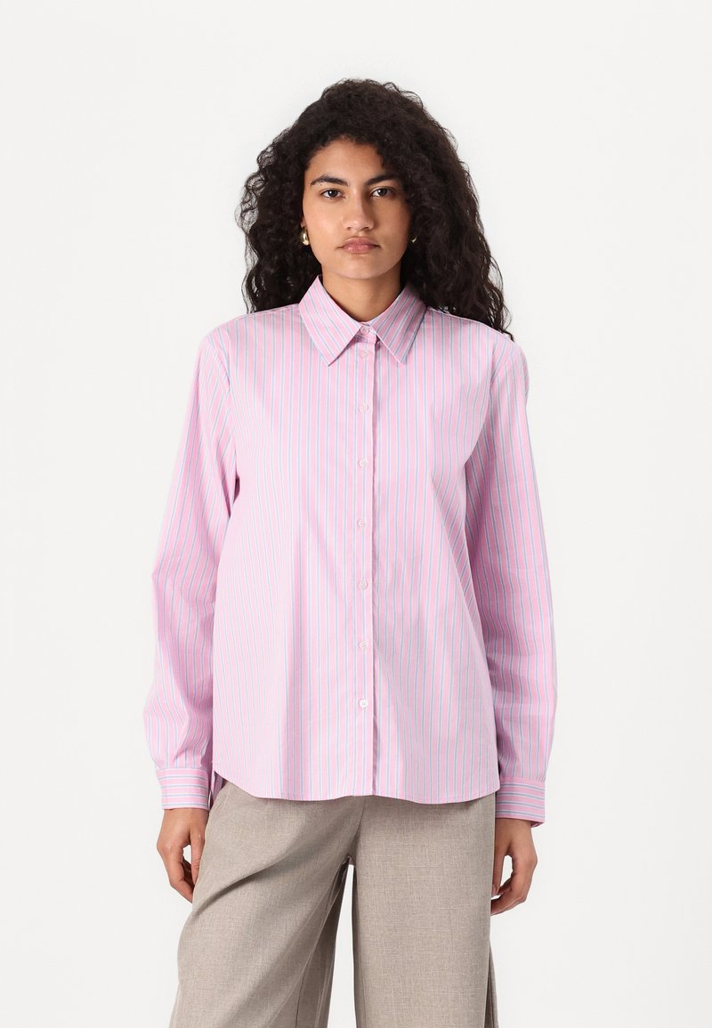 Light pink button-up shirt with blue and purple vertical stripes, long sleeves, and a pointed collar; smooth fabric, relaxed fit.