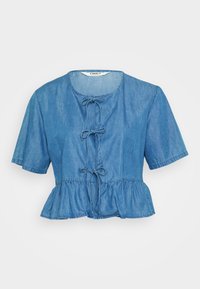 Denim srajca s kratkimi rokavi, svetlo modra, s peplum robom. Ima okroglo izrez in tri dekorativne zanke spredaj. Mehek tekstur.