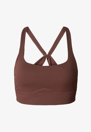 Brassière de sport marron avec un col dégagé, des bretelles croisées dans le dos, et une finition en tissu lisse. Aucun motif ni élément métallique visible.