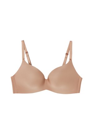 Soutien-gorge push-up beige clair avec des coques lisses, des bretelles réglables et des détails de couture subtils. Fabriqué en tissu doux et extensible.