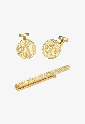 Goldfarbene Manschettenknöpfe und Krawattennadelset mit einer strukturierten, unebenen Oberfläche; runde Manschettenknöpfe und elegantes, flaches Design der Krawattennadel.