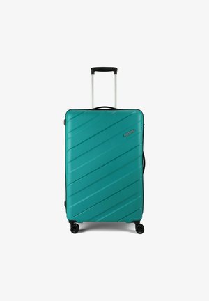 Valise rigide de couleur bleu sarcelle, présentant un design à rayures diagonales. Elle dispose d'une poignée rétractable et de quatre roues noires pour faciliter la mobilité.
