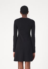 Calvin Klein Jeans CK INTARSIA  - Stickad klänning - black