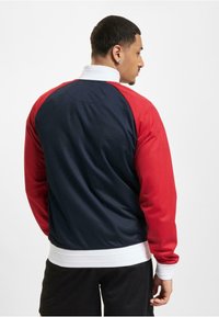 UNFAIR ATHLETICS Bluză de molton cu fermoar - red