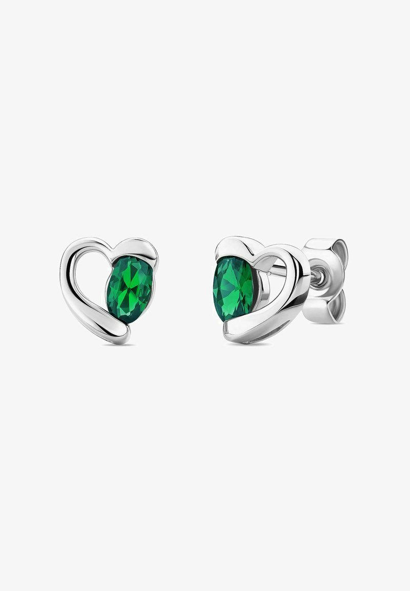 Orecchini a forma di cuore in argento lucido con grandi gemme ovali verdi. Curve morbide e design a sostegno sicuro.