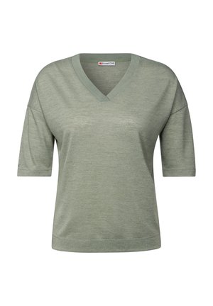 T-shirt verde con scollo a V realizzato in tessuto morbido, con maniche corte e fitting rilassato. Superficie testurizzata senza motivi prominenti.
