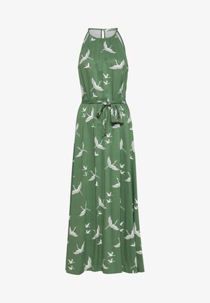 Grünes ärmelloses Maxikleid mit weißen Kranich-Motiven, Neckholder-Ausschnitt, Rückenknopfverschluss und einem Stofftaillengürtel.