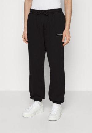 INSTITUTIONAL HWK - Pantalon de survêtement - black