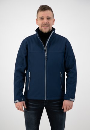 Navy softshell jacket with a stand collar, zippered front, and two zippered pockets. Features grey accents on the collar and cuffs.