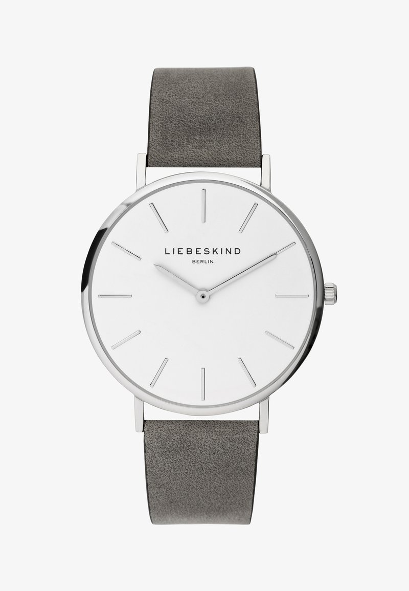 Runde silberne Uhr mit einem weißen Zifferblatt, minimalistischen Markierungen und einem grauen Lederarmband. Verfügt über eine glatte Textur und dezente Markenkennzeichnung.