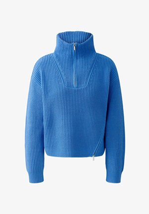 Blue knitted pullover with a high collar and a half-zip closure. Features ribbed texture, long sleeves, and a boxy silhouette.