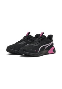 Pantofi sport negri cu un superior din plasă, accente roz și o talpă texturată. Au un guler căptușit și şireturi pentru un fit sigur.
