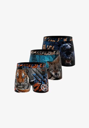 Trois paires de boxers avec des visages d'animaux : tigre, loup et panthère noire, chacun avec des imprimés animaliers et des motifs de texte sur des fonds sombres.