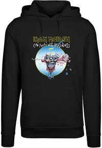 Black hoodie featuring a graphic design with a skull, blue accents, and the text "Iron Maiden Can I Play With Madness." Soft fabric.