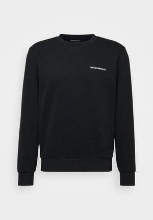 Sudadera negra de mezcla de algodón con cuello redondo. Cuenta con puños y dobladillo acanalados, pequeño logo blanco en el pecho y una textura suave.