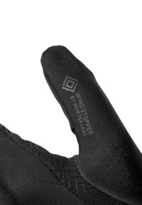 Black gloves featuring a textured grip, Windstopper branding, and a fitted design with a streamlined shape for enhanced performance.