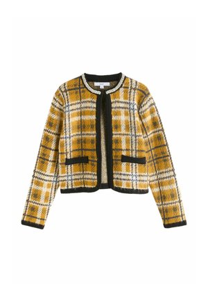 Knitted cropped cardigan in yellow, black, and white plaid pattern. Features a black trim, two open pockets, and a round neckline.