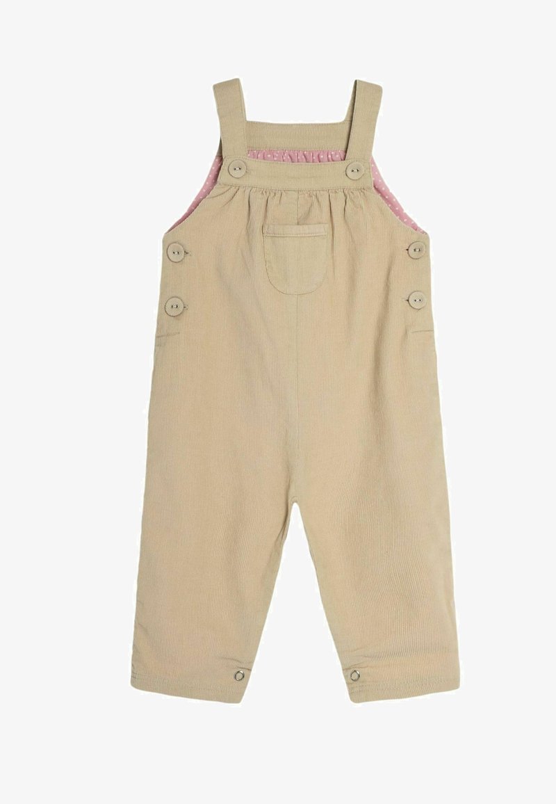 Beige corduroy overalls with adjustable straps, five buttons, and a pink polka dot lining. Features a front pocket and snap bottom closures.