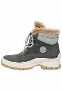 Bottes chelsea en cuir gris avec un col en fourrure, œillets renforcés et une semelle épaisse et texturée dans des couleurs crème et tan.