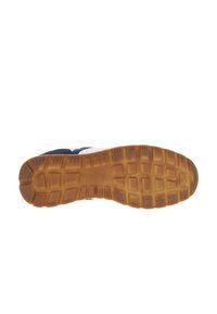Semelle de chaussure avec une surface en caoutchouc texturée de couleur marron. Le design présente des motifs rectangulaires et circulaires pour une meilleure traction et stabilité.