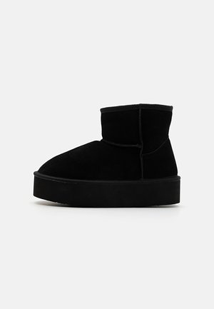 Bottines à plateau - black