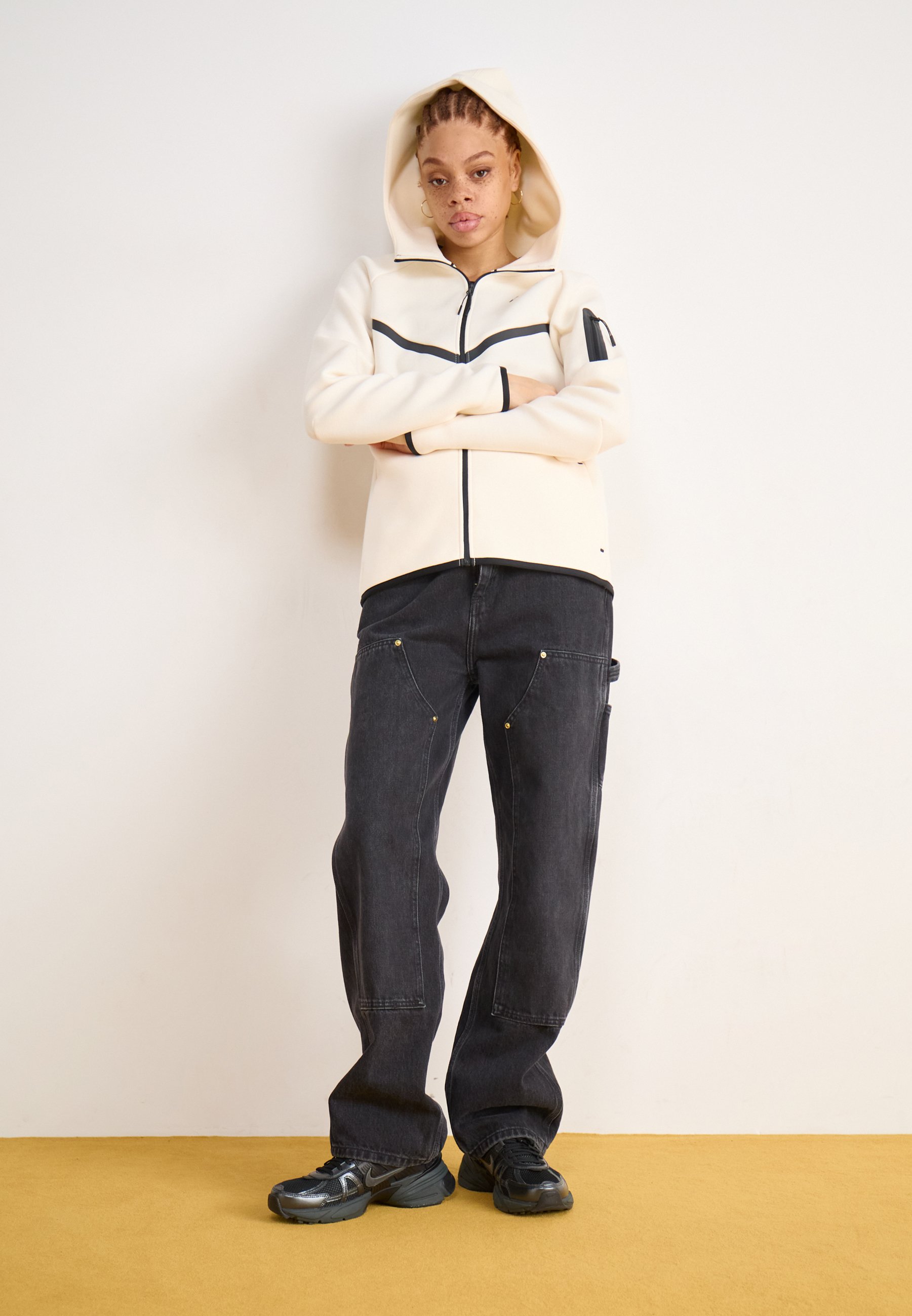 cream nike tech suit