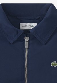 Lacoste PATCH JACKET - Light jacket - marine
