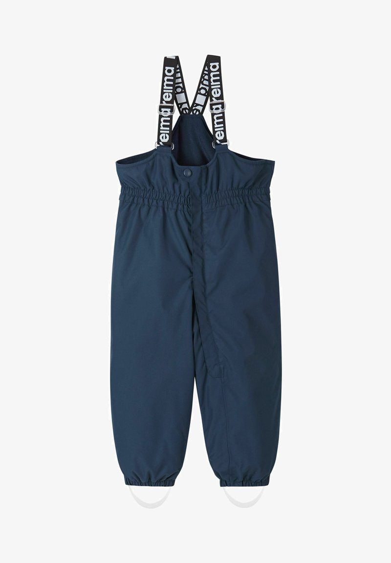 Marine waterdichte overall met elastische taille en enkels. Verstelbare zwarte banden met witte branding. Voorzijde met drukknoopsluiting.