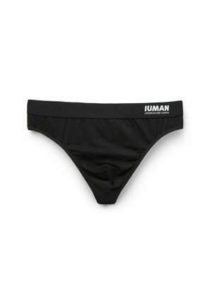 Bañadores tipo bikini para hombres negros con una textura suave, cinturilla elástica y detalle del logo blanco en el lado izquierdo.