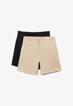 Deux paires de shorts décontractés, un beige avec cordon de serrage et poches à l'avant, et un noir superposé derrière.
